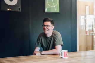 Mike smiles during a meeting at MadeByShape