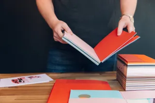 Close up of Andy browsing paper samples