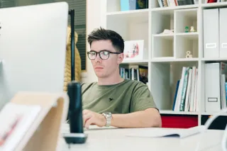 Close up of Mike working on his imac