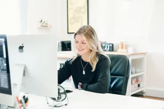 Kirsty happy at work