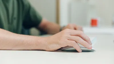 Close up of mikes hand busy at work