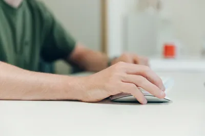 Close up of mikes hand busy at work