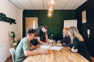The team discuss the days task in the MadeByShape studio