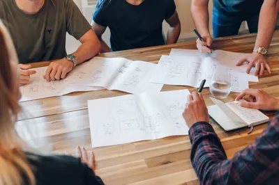 The MadeByShape team go through website wireframes