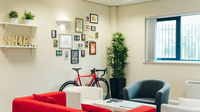 A bicycle against the feature wall in the MadeByShape studio