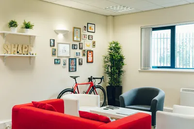 A bicycle against the feature wall in the MadeByShape studio