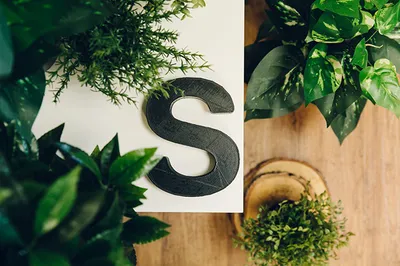 MadeByShape letter S on a desk